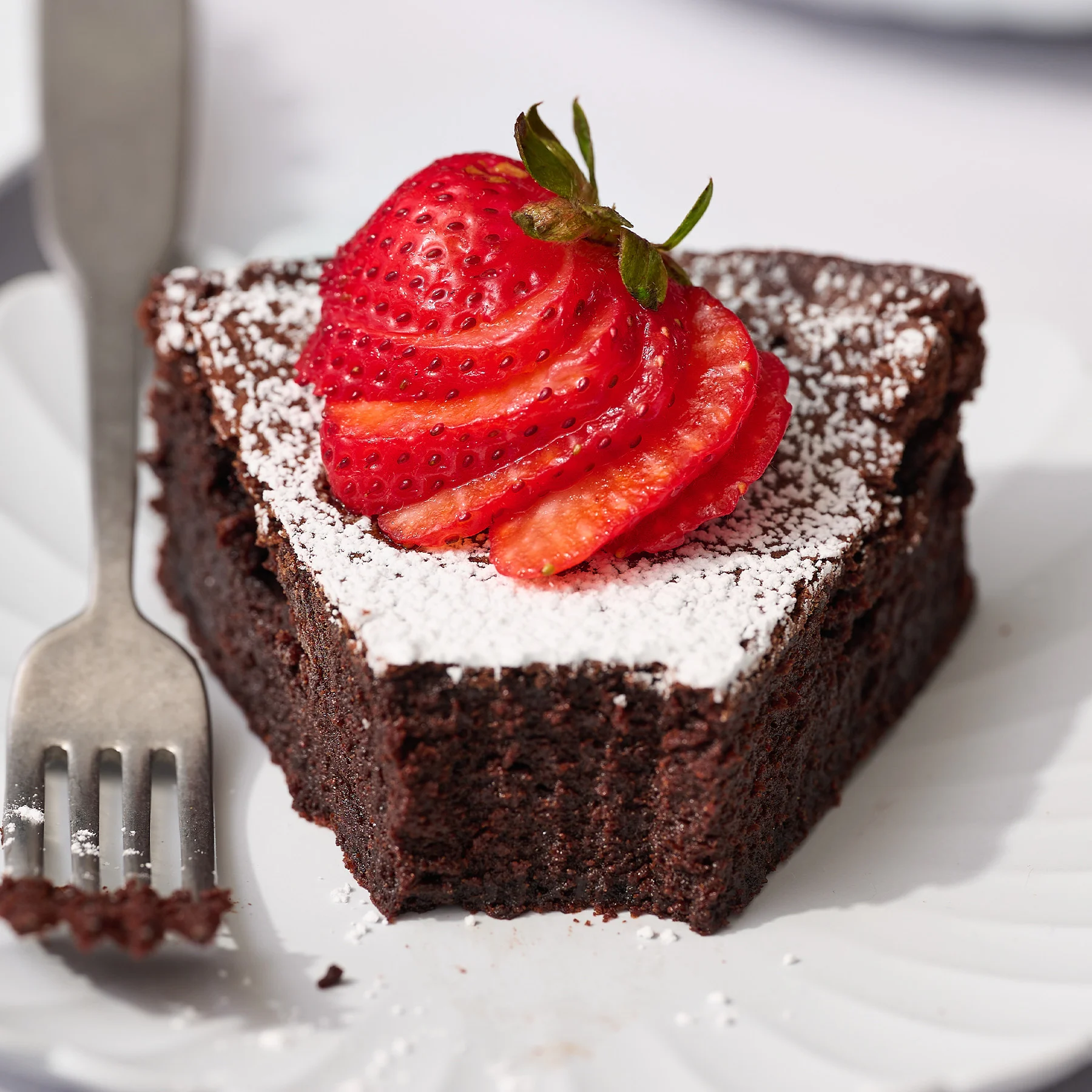 Indulge In A Slice Of Pure Chocolate Decadence With Our Flourless 